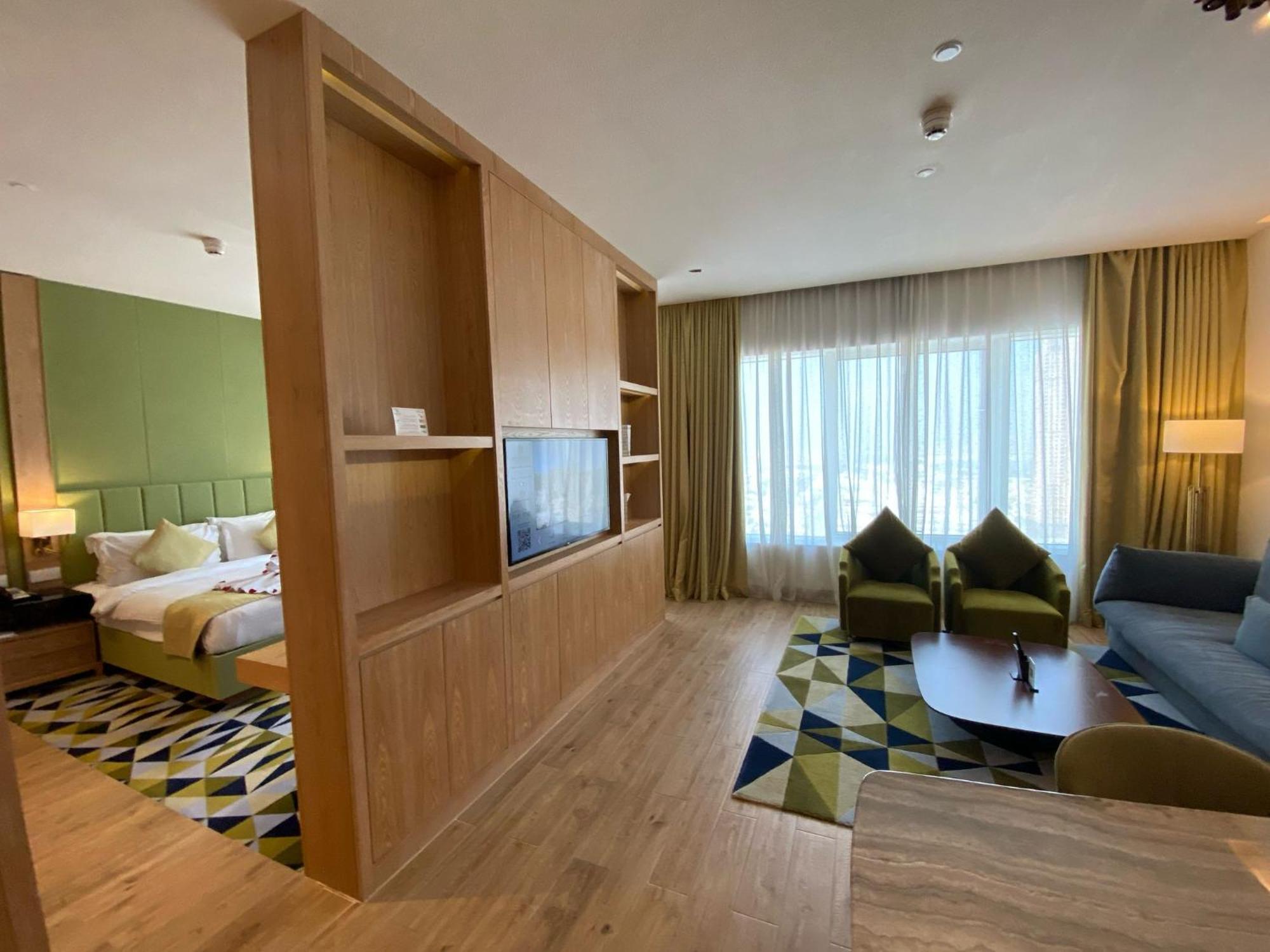 The Bentley Luxury Hotel & Suites Doha Exterior photo A suite at the hotel